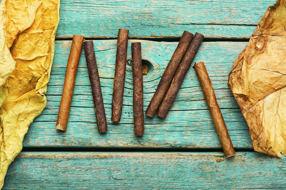 Cigars and tobacco leaves.
